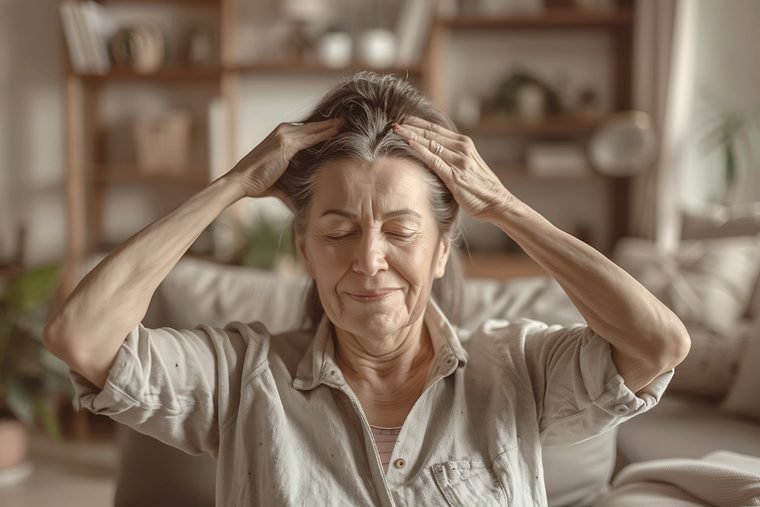 Woman with hands in her hair